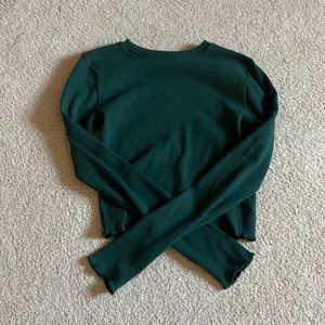 Hi I’m selling this green crop top with long sleeves